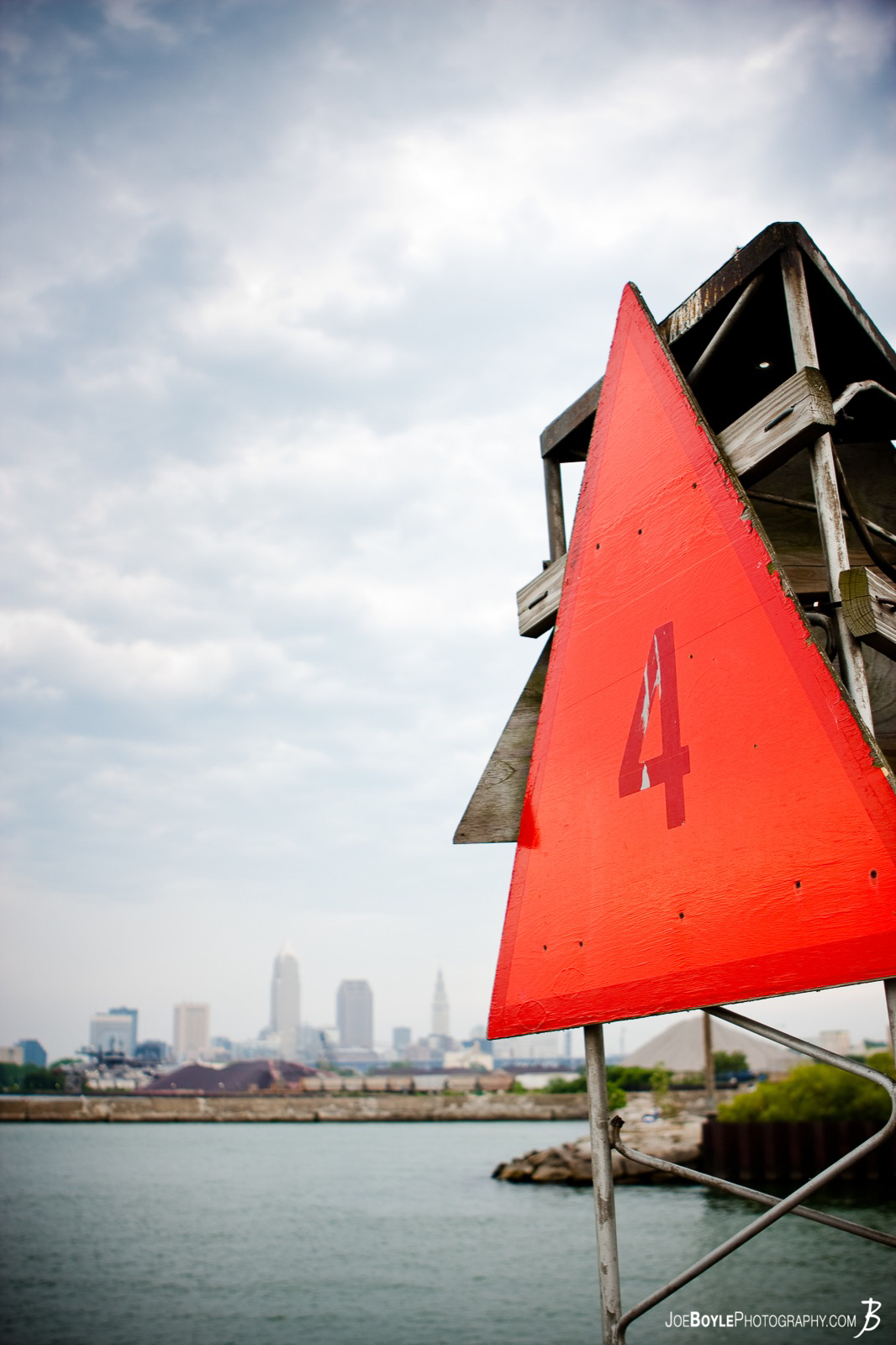  A picture of a marker at Edgewater Yacht Club with the Clevland skyline in the background. 