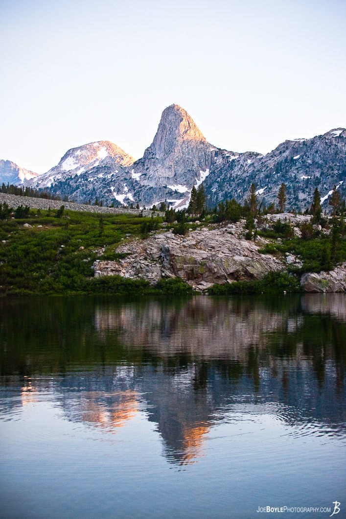 As I woke up from my campsite one morning while hiking the John Muir Trail (JMT), I was fortunate enough to capture the sunrise showing itself upon this mountain. 