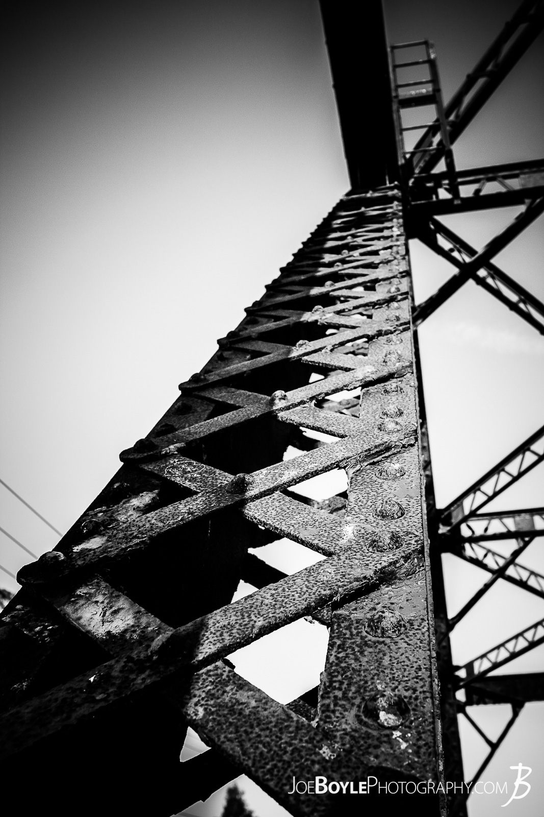  I visited the Beach and Boardwalk at Santa Cruz, California and this really cool looking bridge was nearby. I don't think it was in use anymore. Here is a black and white photo of the bridge pylon. 