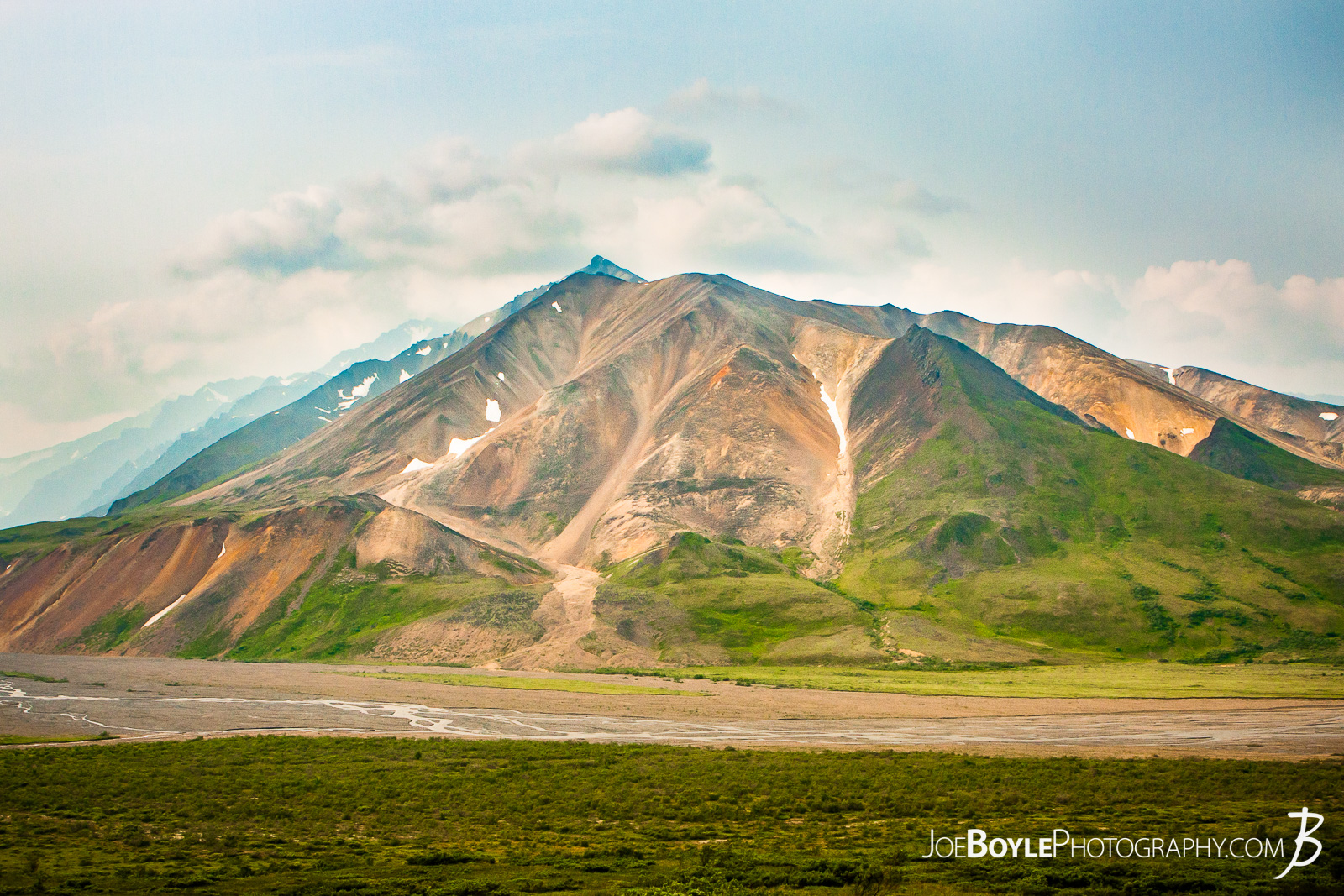  My friend Josh and I spent a considerable time in Alaska (about 3 weeks) and travelled to quite a few different parks in a short span of time. Here is a photo from within grid 6 looking out over grid 7 in Denali National Park. As you can see Alaska has some beautiful mountains and flowing rivers. There was a glacier at the start of the river that we tried to get to but ran out of time! Traversing the Alaska, untrailed, terrain took us much longer than we thought! 