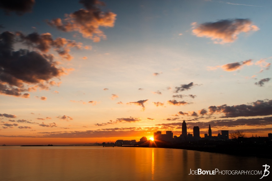 A beautiful Cleveland sunrise with the sun just peeking over the majestic Cleveland Skyline.