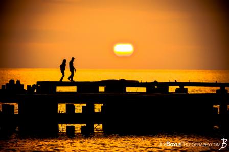 sunset-in-cleveland-off-of-lake-erie-people-on-a-pier