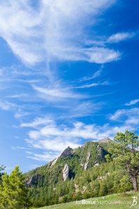 flat-irons-green-field-blue-sky-in-boulder-colorado-chautauqua-state-park