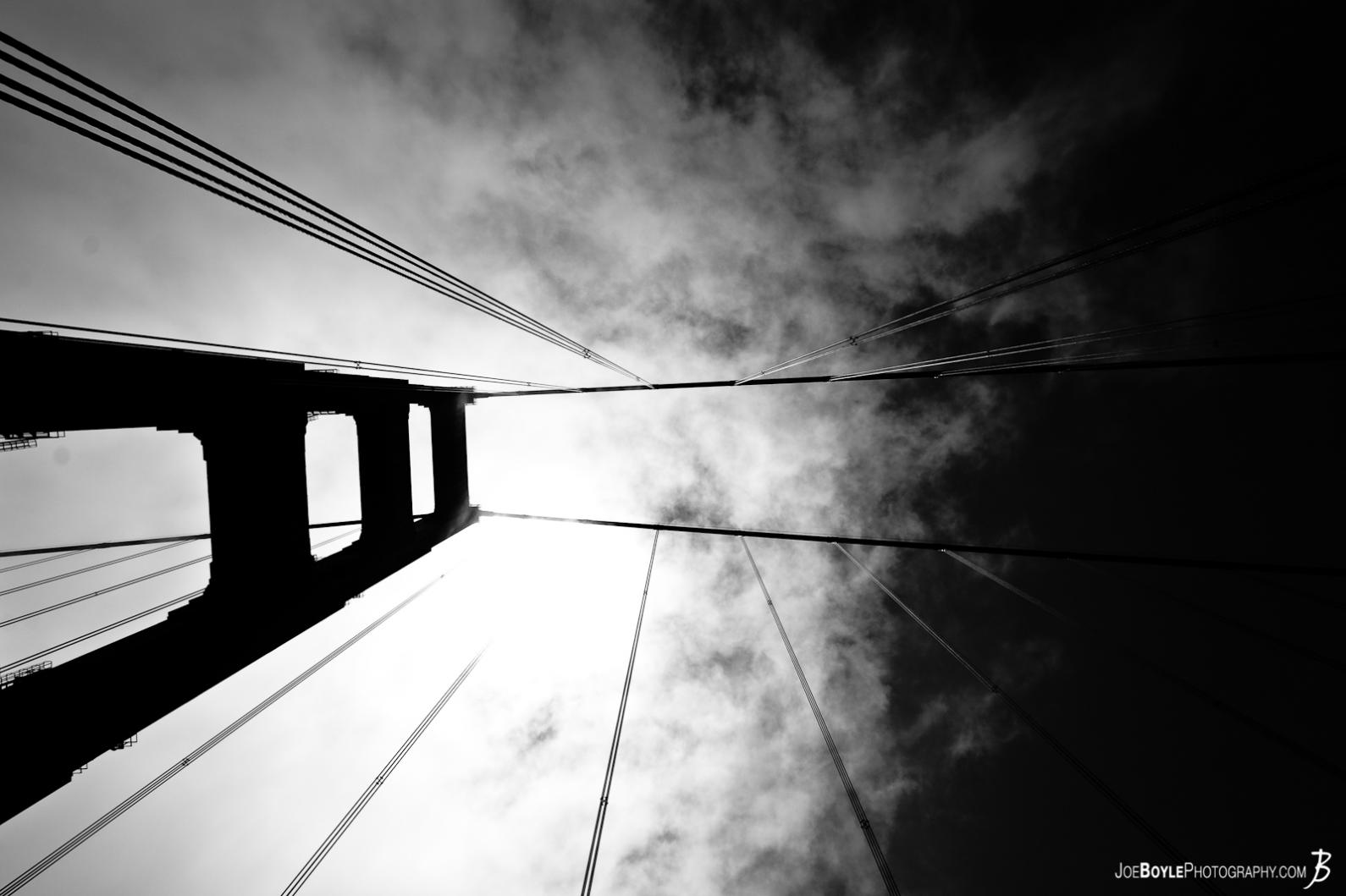 golden-gate-bridge-tower-cables-sky-bw